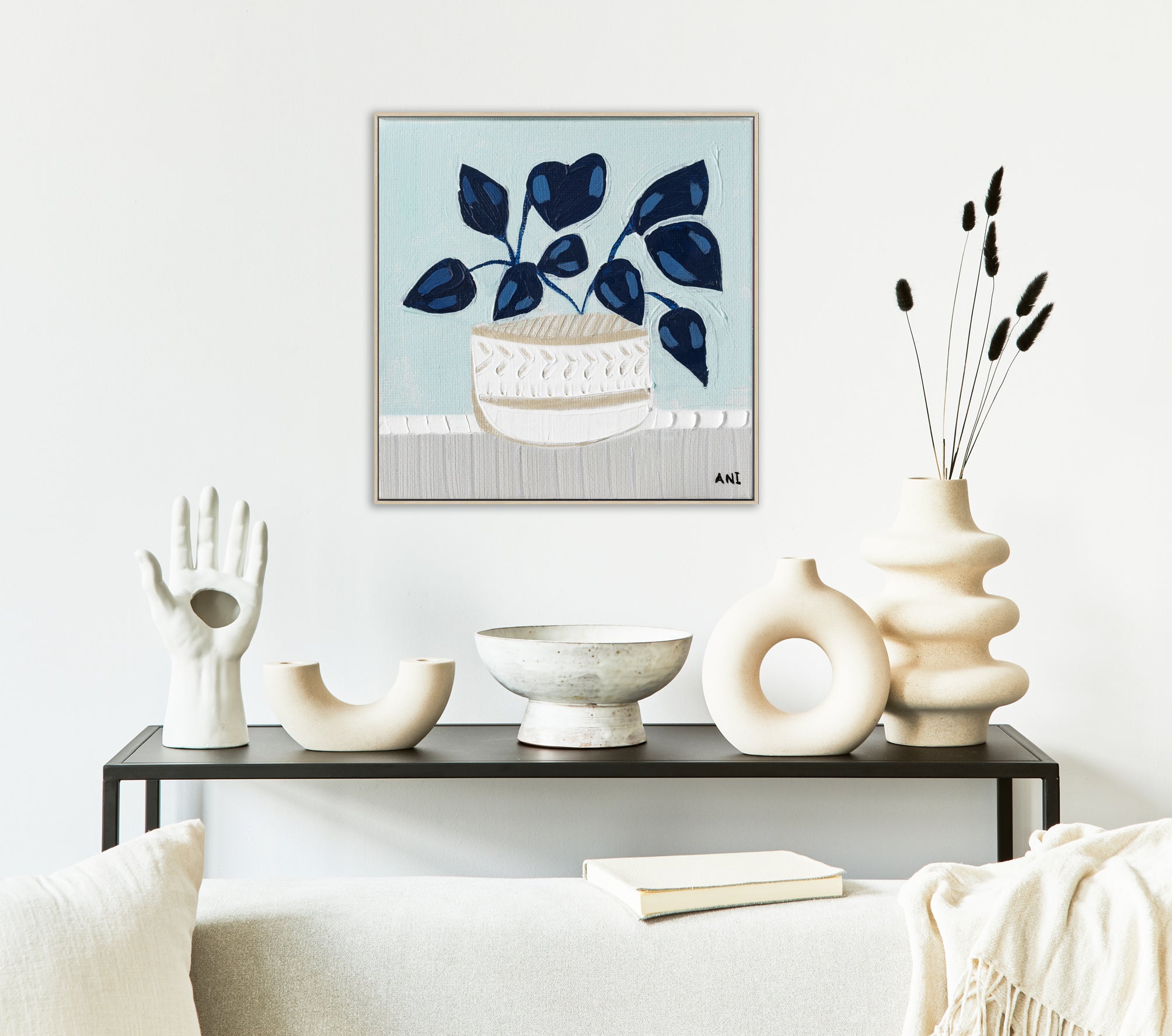 Blue Monstera botanical wall art print by Melbourne artist Ani Ipradjian, featuring an abstract monstera leaf in calming blue tones symbolising growth, good luck, freedom, and creativity. Contemporary Australian plant-inspired artwork ideal for modern interiors, home offices, and nature-inspired décor.