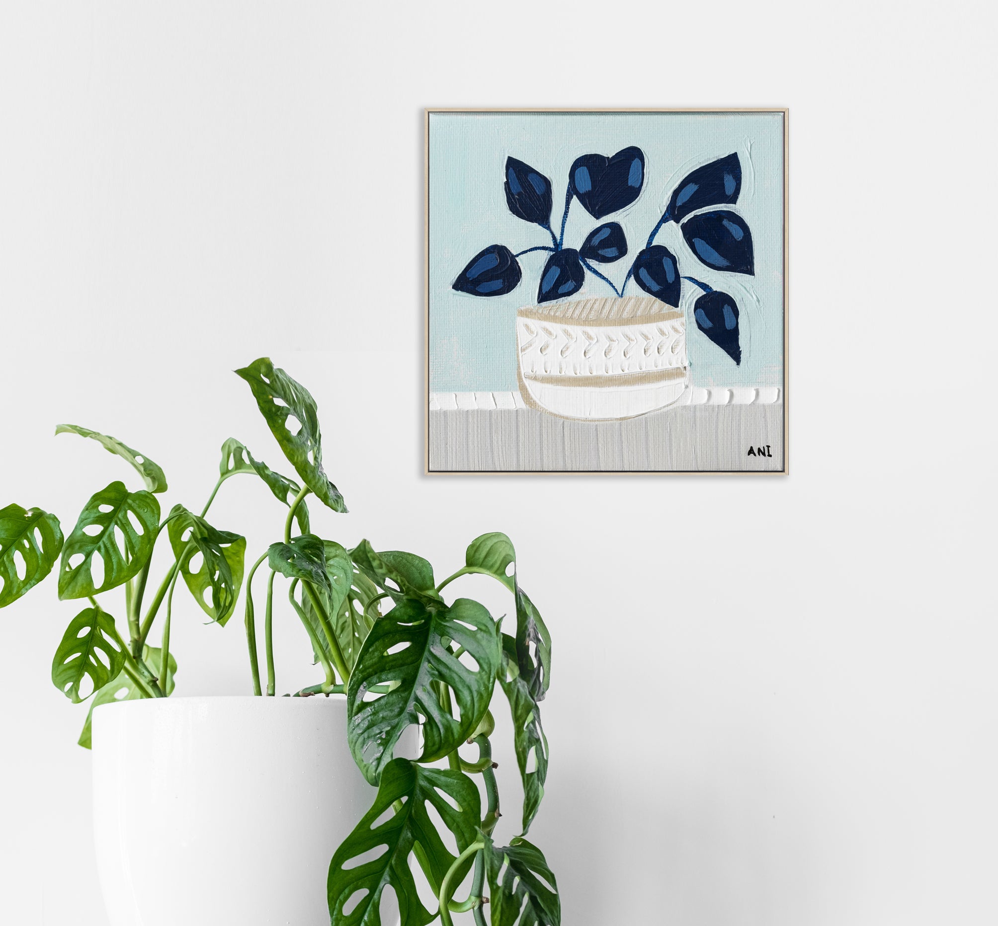 Blue Monstera botanical wall art print by Melbourne artist Ani Ipradjian, featuring an abstract monstera leaf in calming blue tones symbolising growth, good luck, freedom, and creativity. Contemporary Australian plant-inspired artwork ideal for modern interiors, home offices, and nature-inspired décor.
